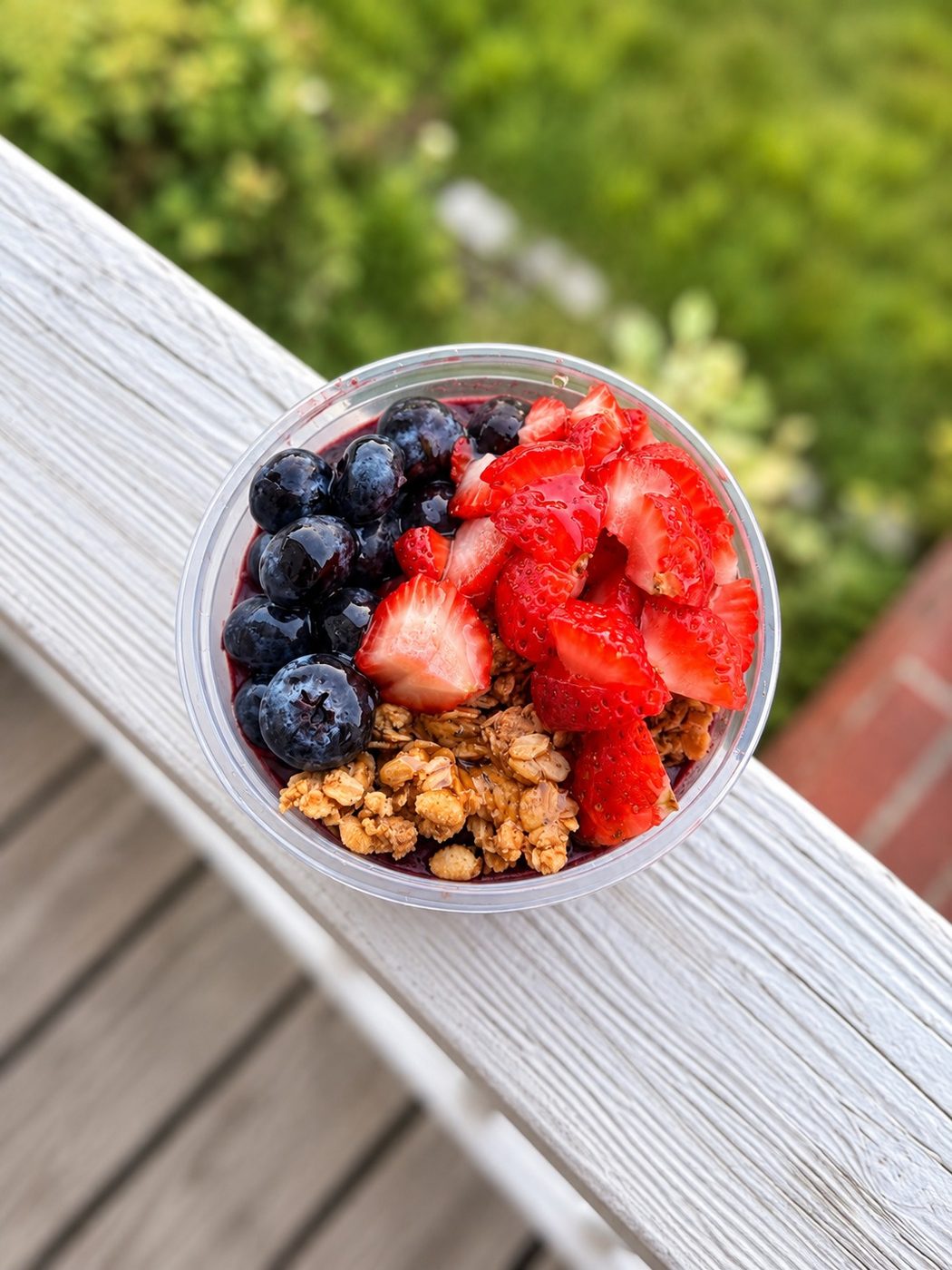 Açaí bowl with strawberry, blueberry and granola